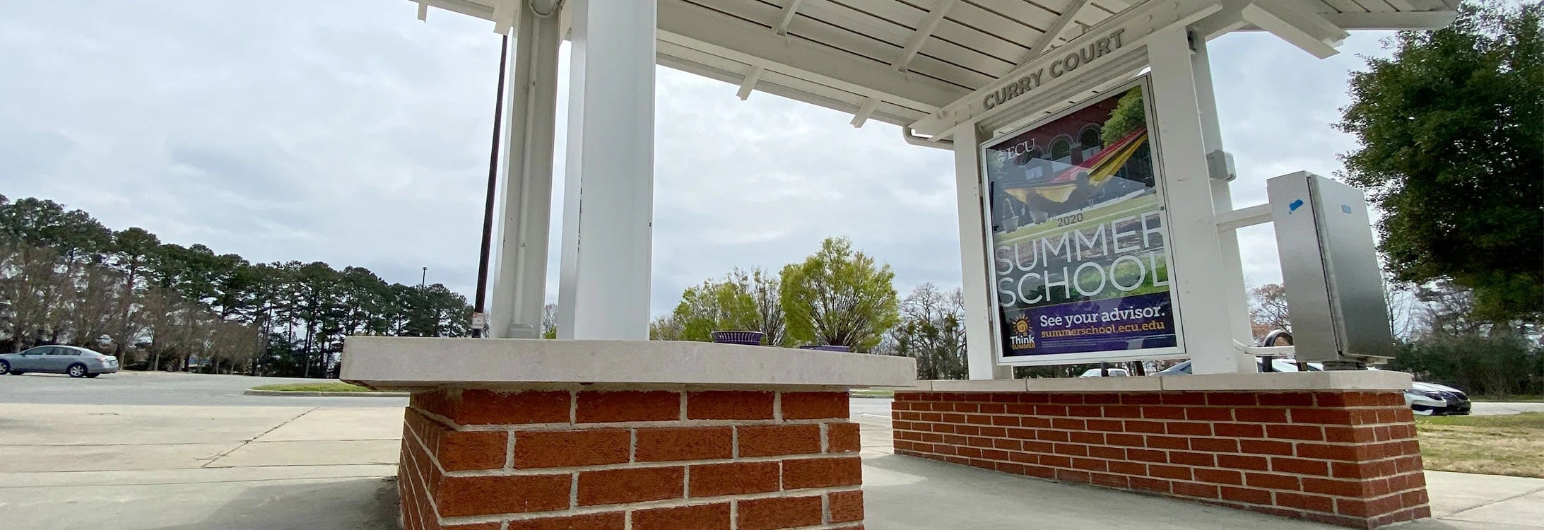 advertisement displayed at a bus shelter